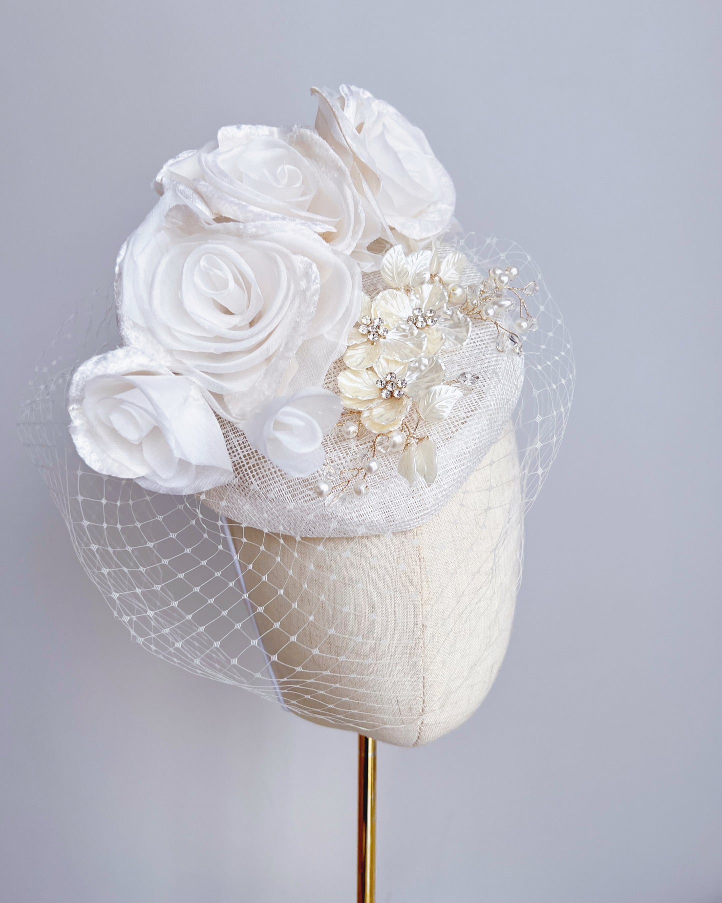 Fascinator with Flowers, Veiling and Embellishment