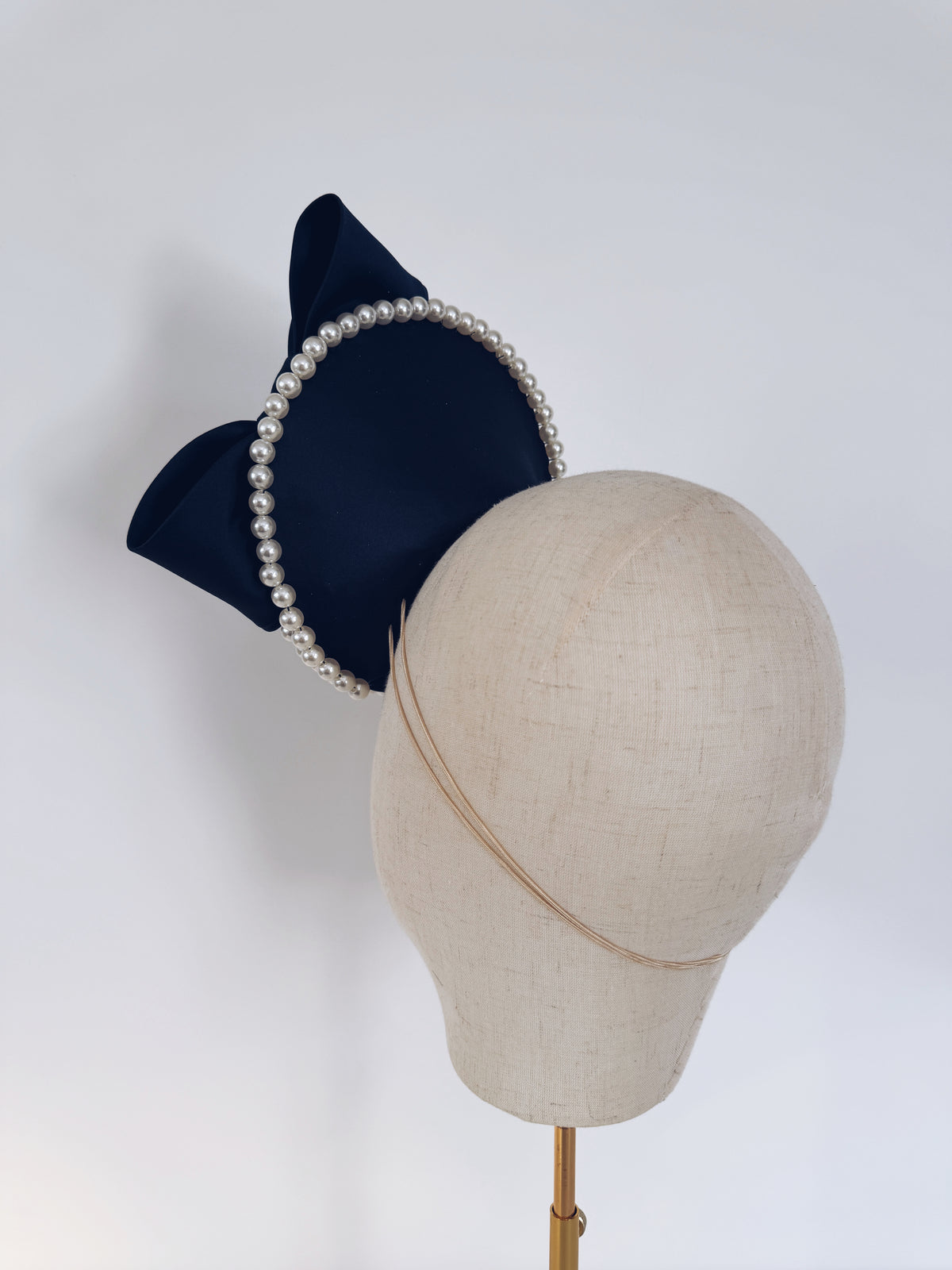 Navy satin headpiece with pearls