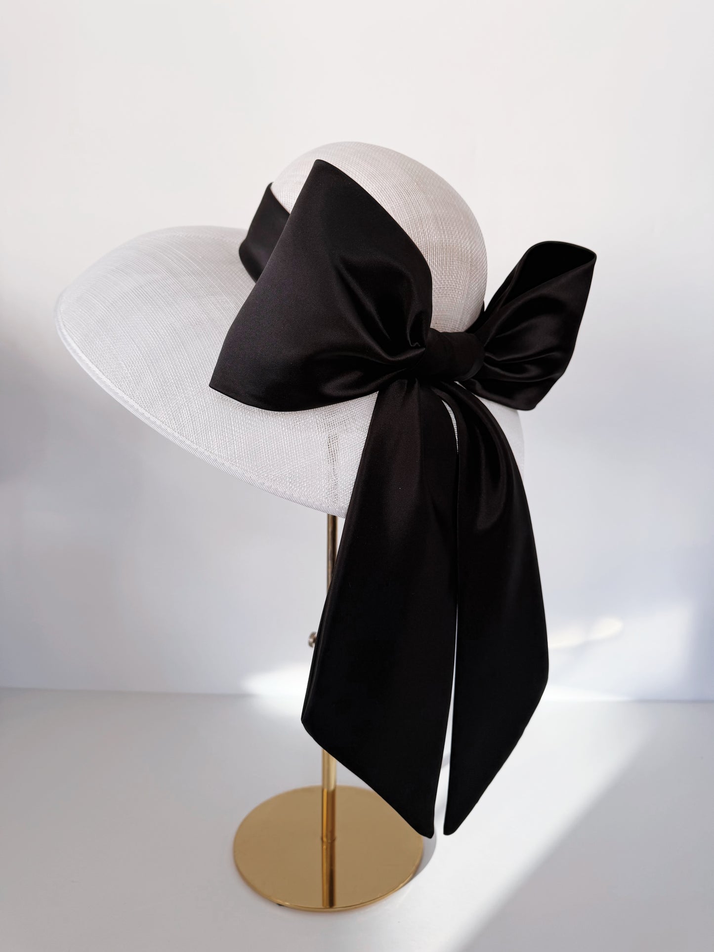 Hat in White with a Satin Bow in Black
