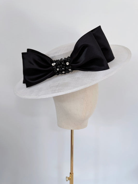 Boater with a double bow and embellishment