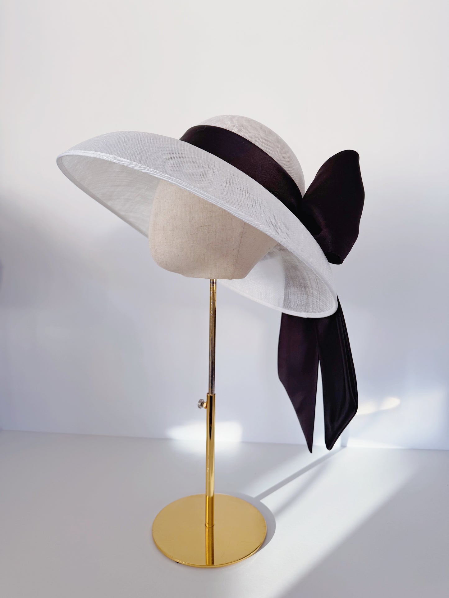 Hat in White with a Satin Bow in Black