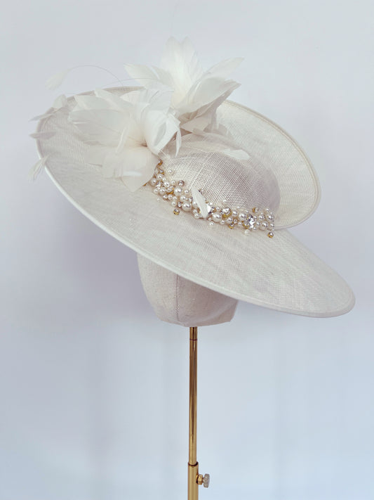 Ivory Hat adorned with Feathers