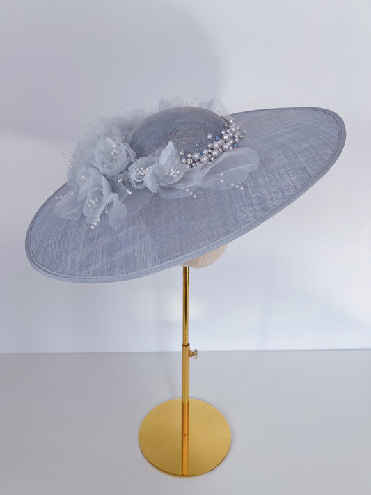 Large Hat Adorned with Flowers and Beads